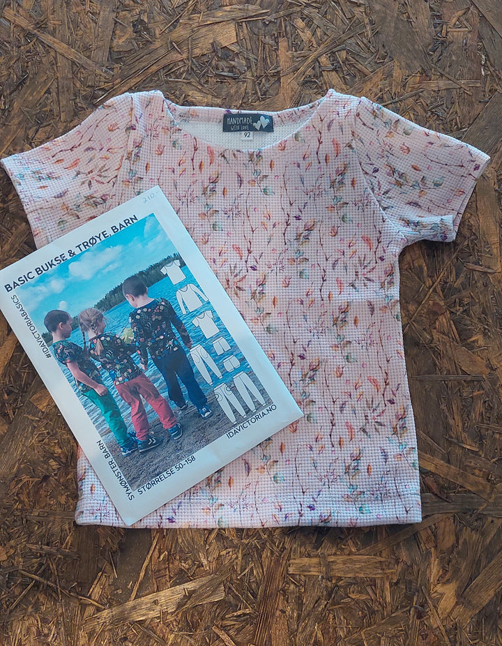 Vaffeljersey - rosa m/blomster